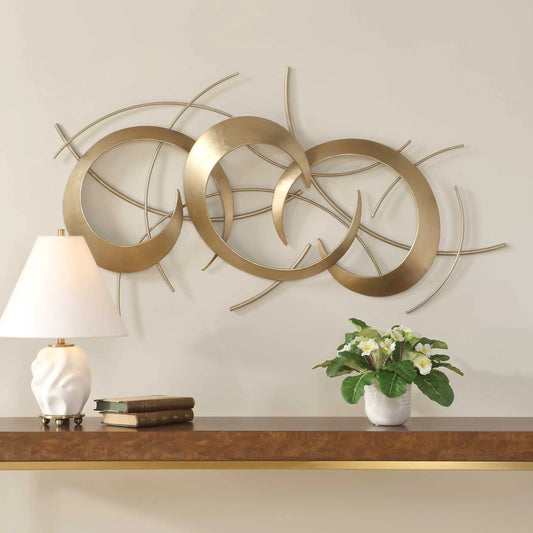 Motivate Wall Art by Uttermost in antique gold. Made from iron in a unique style.