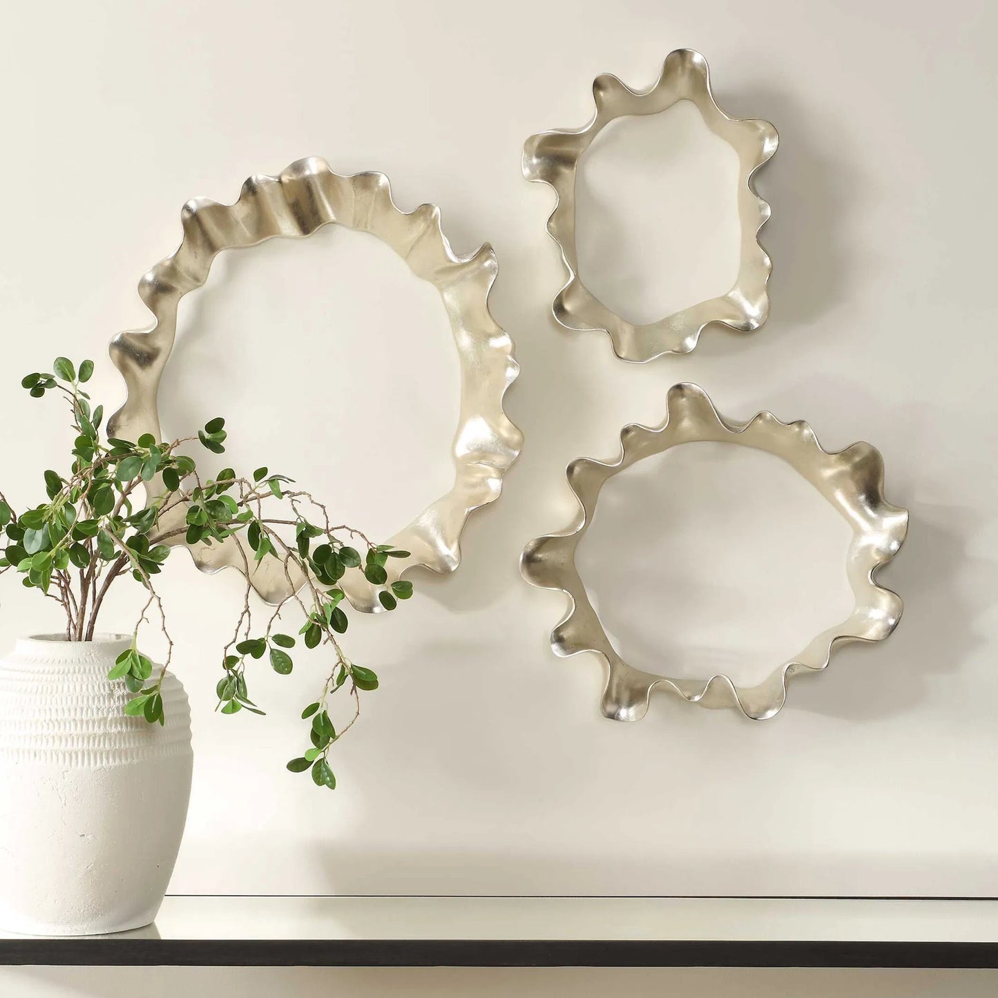 001 SI-2386557 | Lifestyle | Ripple Effect Wall Art by Uttermost in silver leaf. Made from resin in a modern style.