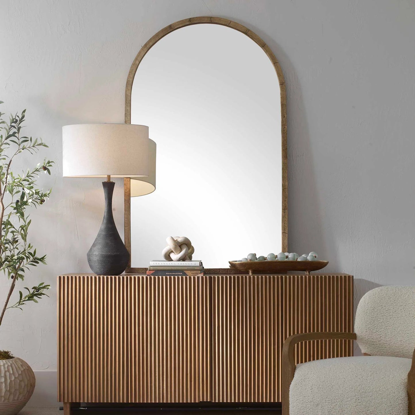 003 SI-2453061 | Lifestyle | Vestry Arch Mirror by Uttermost in brass. Made from aluminium, glass, mdf, iron in a transitional style.