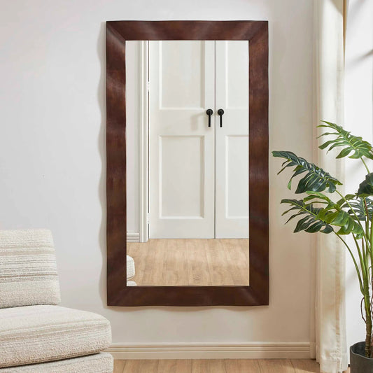 Wrinkle Wavy Mirror by Uttermost in walnut. Made from rubber wood, mdf, mirror in a unique style.