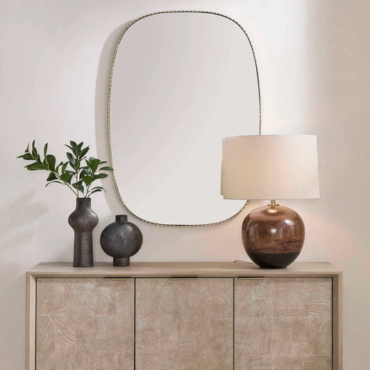 Nidia Mirror by Uttermost in antique gold. Made from iron, mdf, mirror in a unique style.