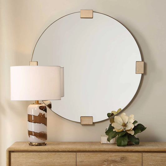 Russo Travertine Round Mirror by Uttermost in bronze, brown, gold. Made from iron, mdf, mirror, travertine in a unique style.