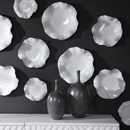 Abella Ceramic Wall Decor by Uttermost. Made from ceramic in a coastal style.