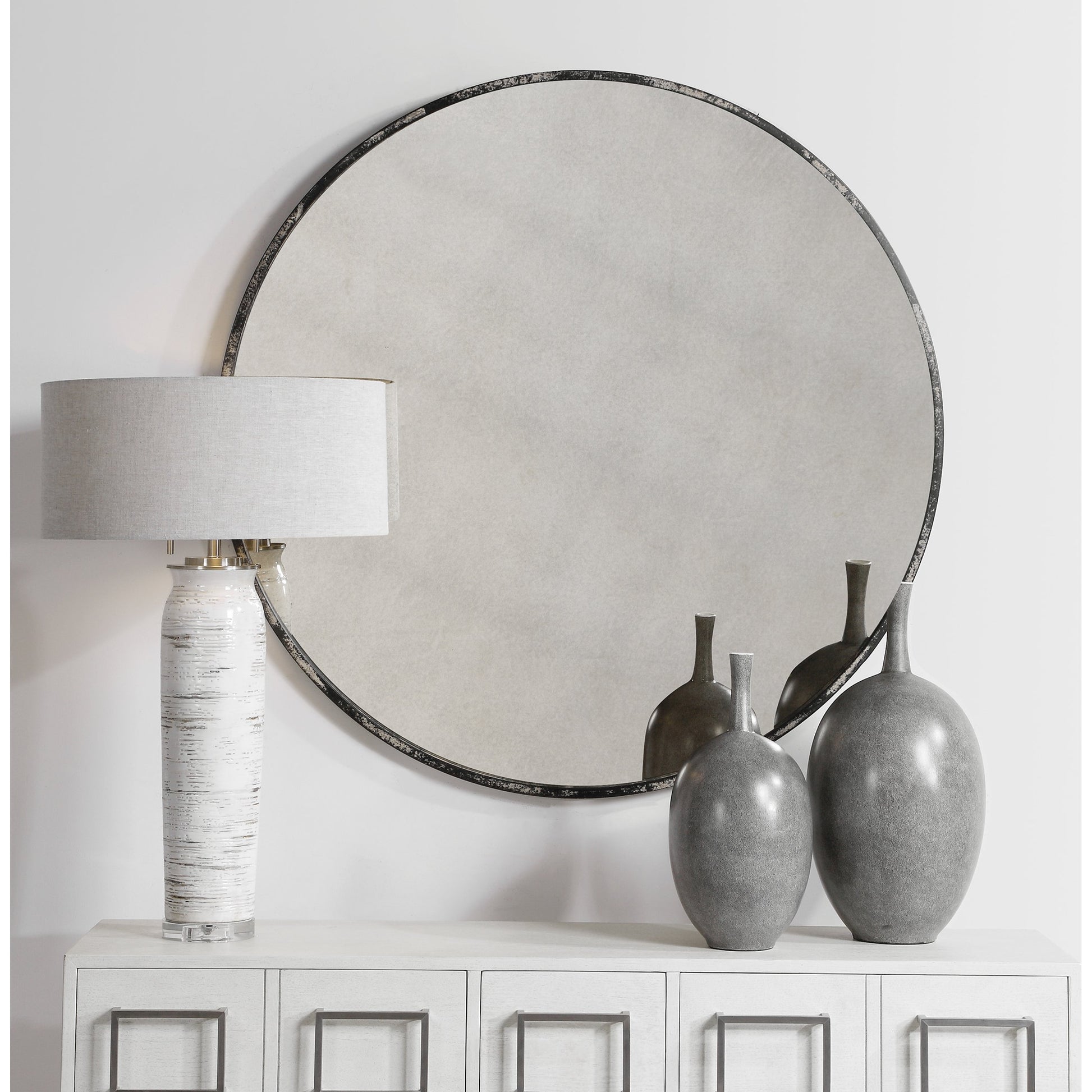 Argand Industrial Round Mirror by Uttermost. Made from metal, mdf, glass in a modern style.