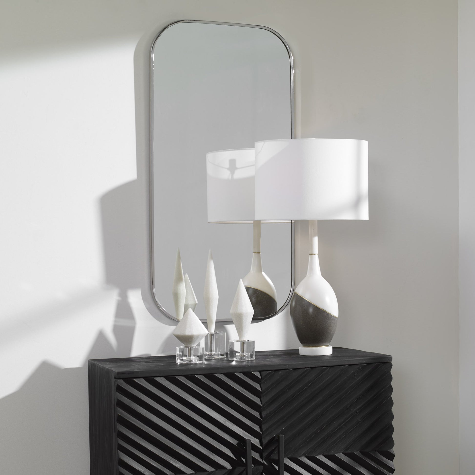 Taft Mirror by Uttermost. Made from stainless steel, mdf, glass in a modern style.