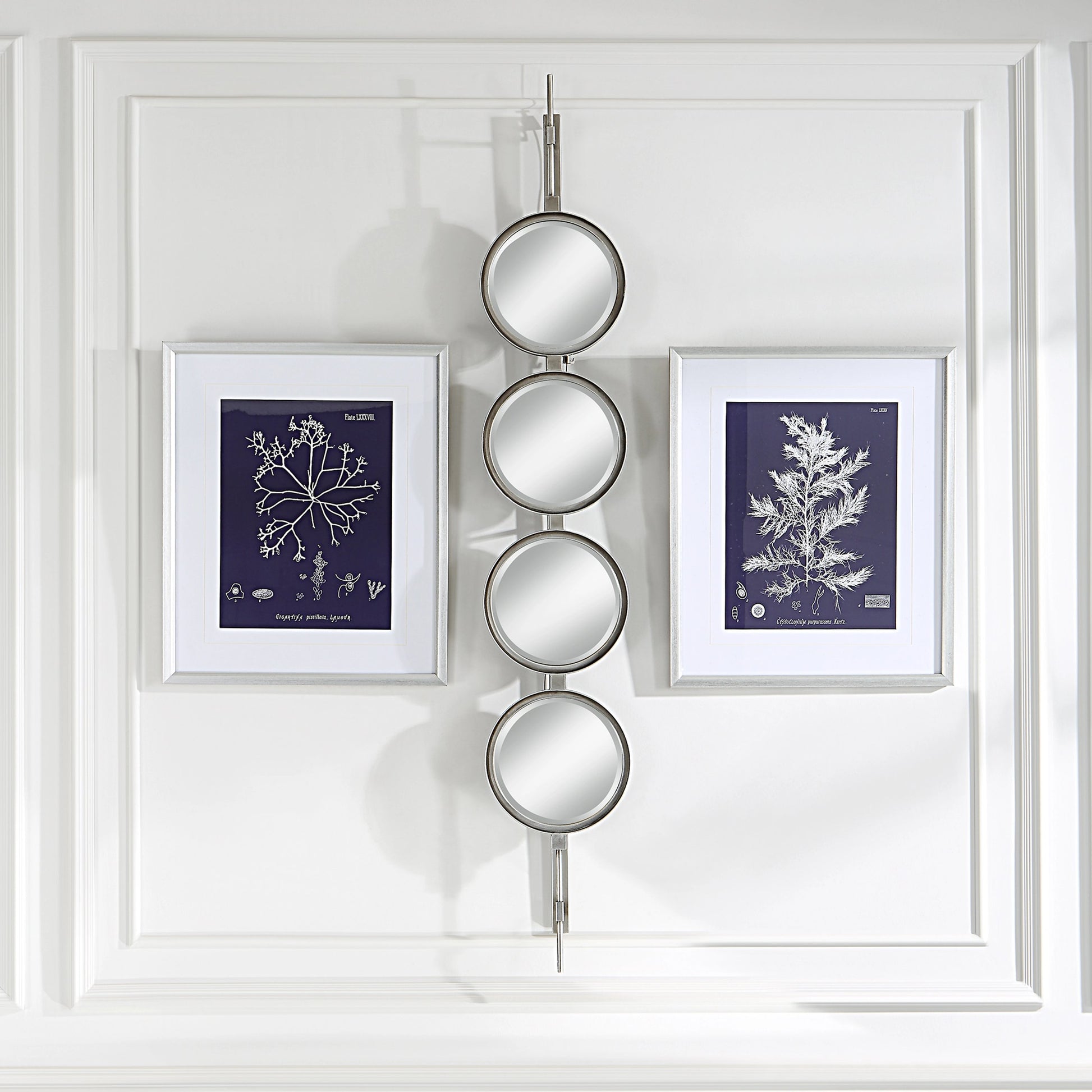Button Mirror by Uttermost. Made from iron, mdf, glass in a transitional style.