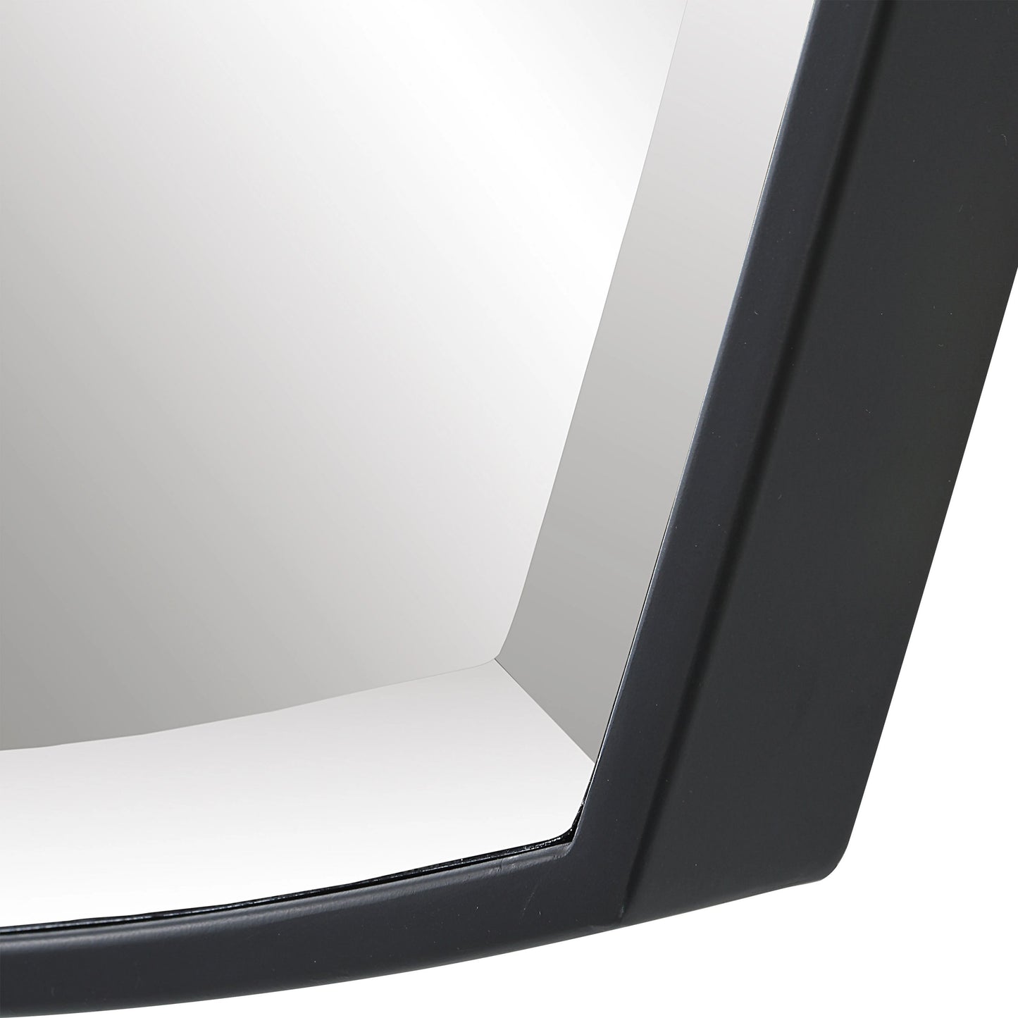 005 SI-1981216 | Closeup | Crest Curved Mirror by Uttermost in satin black. Made from metal, mirror in a modern style.