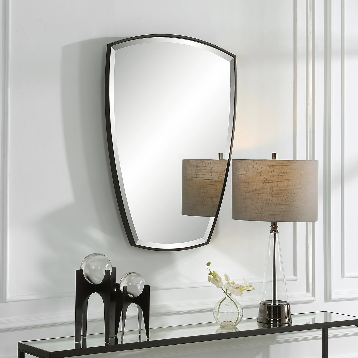 003 SI-1981216 | Lifestyle | Crest Curved Mirror by Uttermost in satin black. Made from metal, mirror in a modern style.