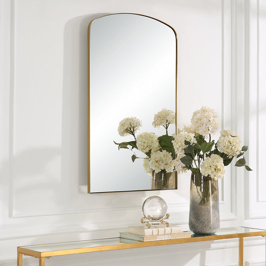 Tordera Arch Mirror by Uttermost in brass. Made from stainless steel, mdf, glass in a modern style.