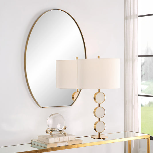 Cabell Oval Mirror by Uttermost in brass. Made from stainless steel, mdf, glass in a modern style.