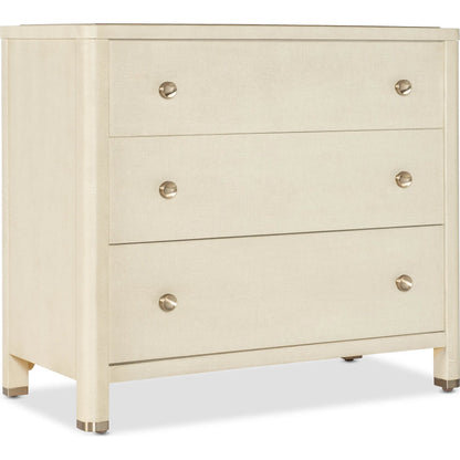 Archives Raffia Three-Drawer Chest by Hooker Furniture in flax. Made from oak veneers, raffia, cedar, metal caps in a transitional style.