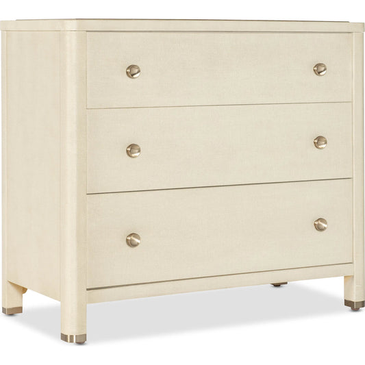 Archives Raffia Three-Drawer Chest by Hooker Furniture in flax. Made from oak veneers, raffia, cedar, metal caps in a transitional style.