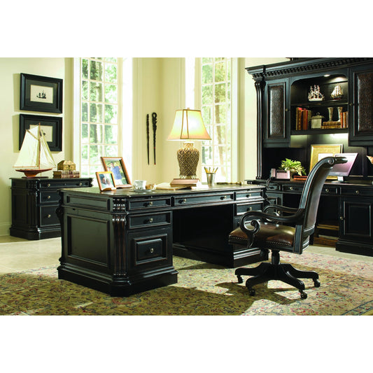 Telluride Tilt Swivel Chair by Hooker Furniture in brown. Made from cherry veneers with carved leather (aniline plus pigment), nailhead trim in a traditional style.