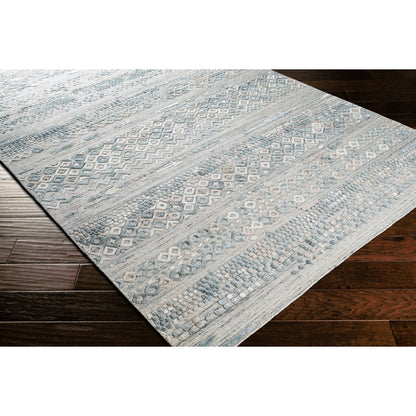 Makalu MKL-2302 Rug by Surya in pale blue, medium gray, dusty sage, light gray, tan. Made from 70% viscose, 30% wool in a unique style.