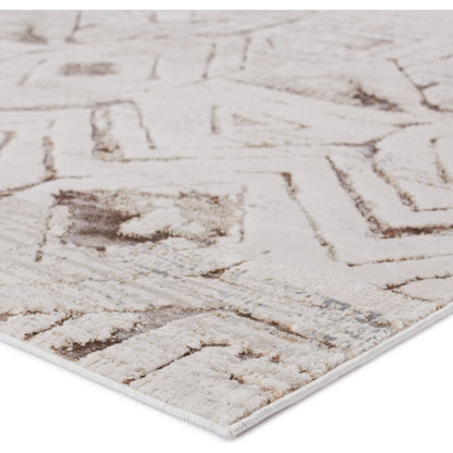 Malilla by Nikki Chu MLI06 Rug by Jaipur Living in cream, taupe. Made from 65% polyester 35% polypropylene in a unique style.