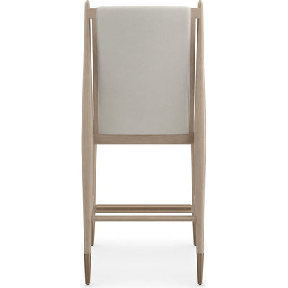 Unity Light Counter Stool by Caracole. Made from oak in a unique style.