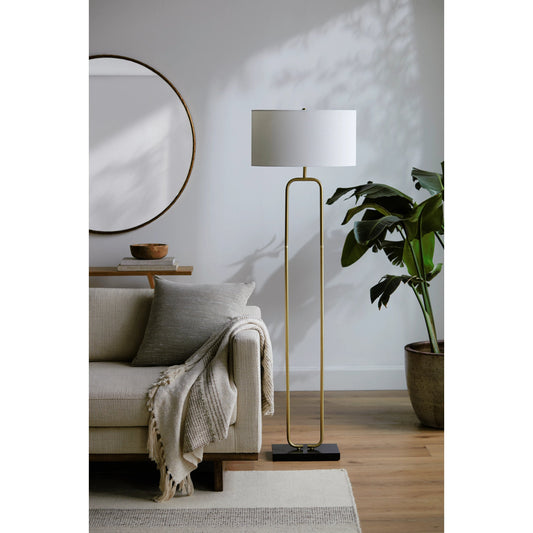 Molto - 528932 by Surya in body: metallic - brass, base: black, shade: white, finial: metallic - brass, harp: metallic - brass, cord: translucent and plated. Made from body: metal, shade (outside): linen, finial: metal in a mod