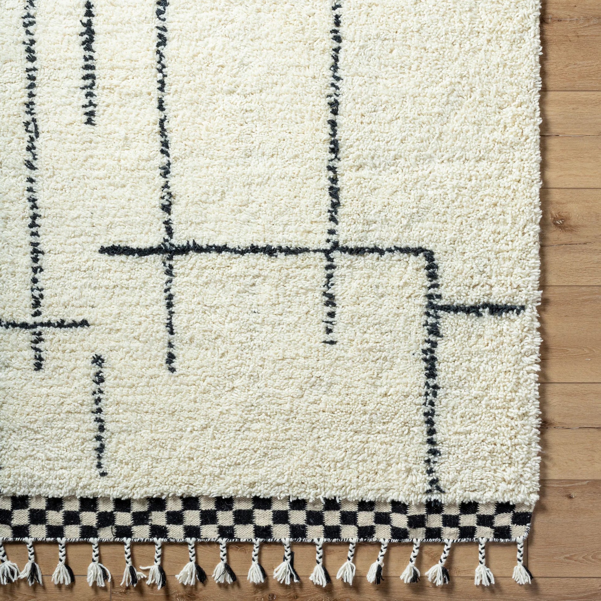 Mirela MMI-2300 Rug by Livabliss in ivory, charcoal, jet black. Made from face: 100% wool, warp: 100% cotton in a unique style.