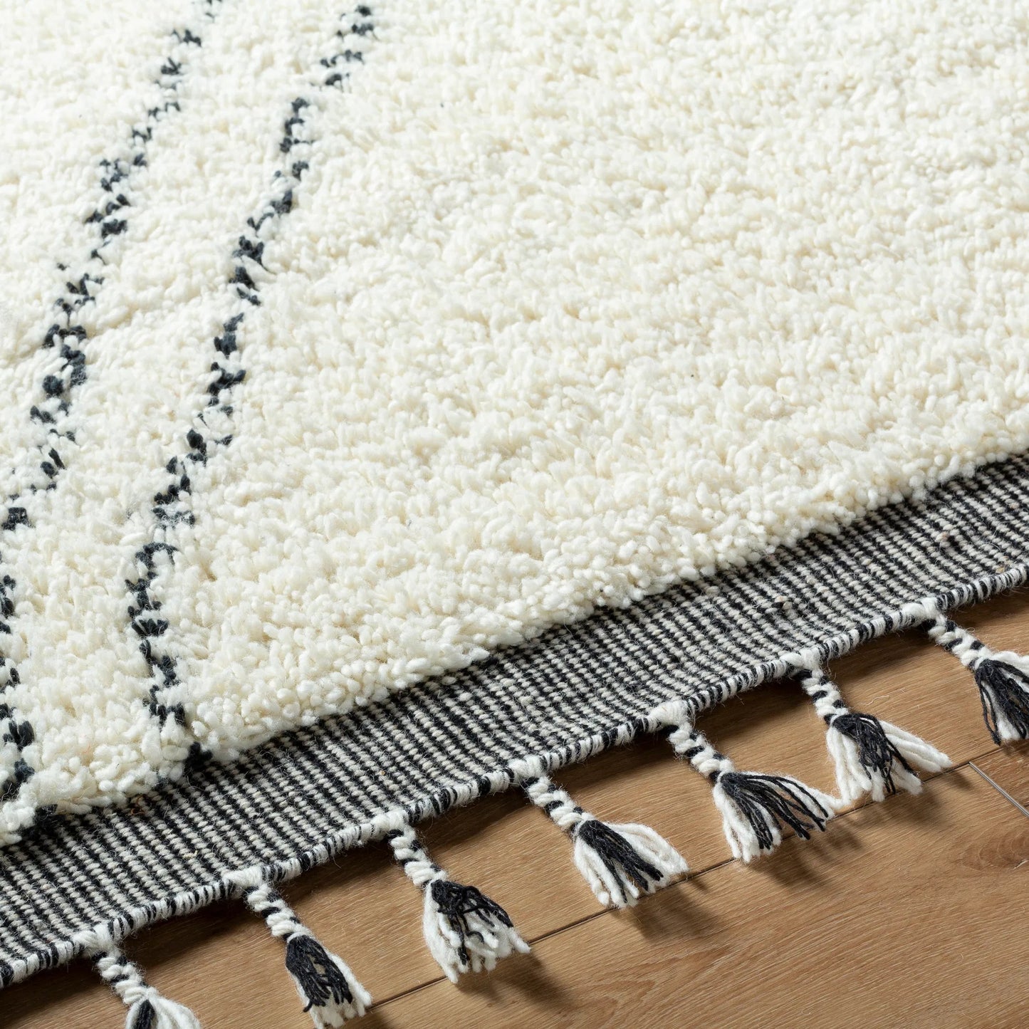 004 SI-2131551,SI-2131552,SI-2131553,SI-2131554 | Closeup | Mirela MMI-2302 Rug by Livabliss in ivory, charcoal, slate gray. Made from face: 100% wool, warp: 100% cotton in a unique style.