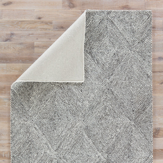 Traditions Made Modern Tufted MMT19 Rug by Jaipur Living in white, gray. Made from 100% wool in a unique style.