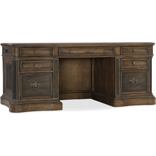 St. Hedwig Executive Desk by Hooker Furniture in saddle brown, anthracite black. Made from white oak, walnut veneers with high quality bonded leather, resin in a traditional style.