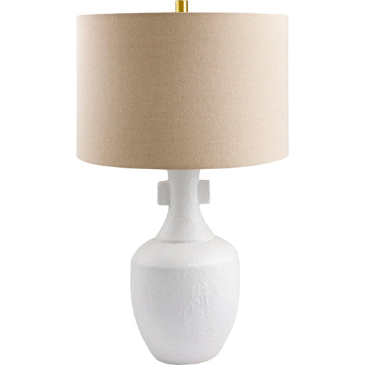 Mauna - 500118 by Surya in body: white, shade: wheat, finial: metallic - brass, harp: metallic - brass, cord: translucent and colored, polished. Made from body: ceramic, shade (outside): linen, shade (inside): polyester, 
