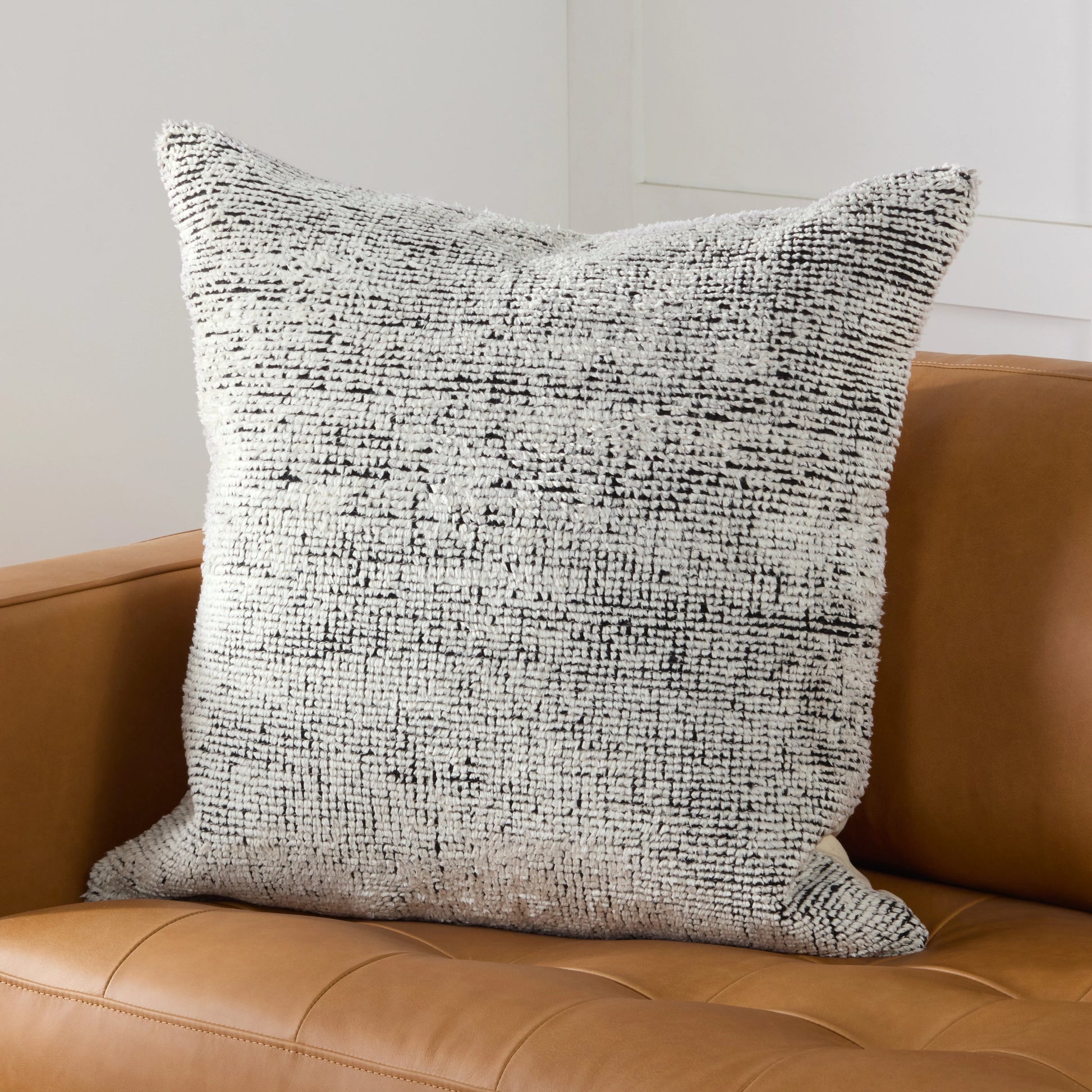 Montane MNT01 Pillow by Jaipur Living in cream, black. Made from 50% wool 50% silk in a cottage & farmhouse style.