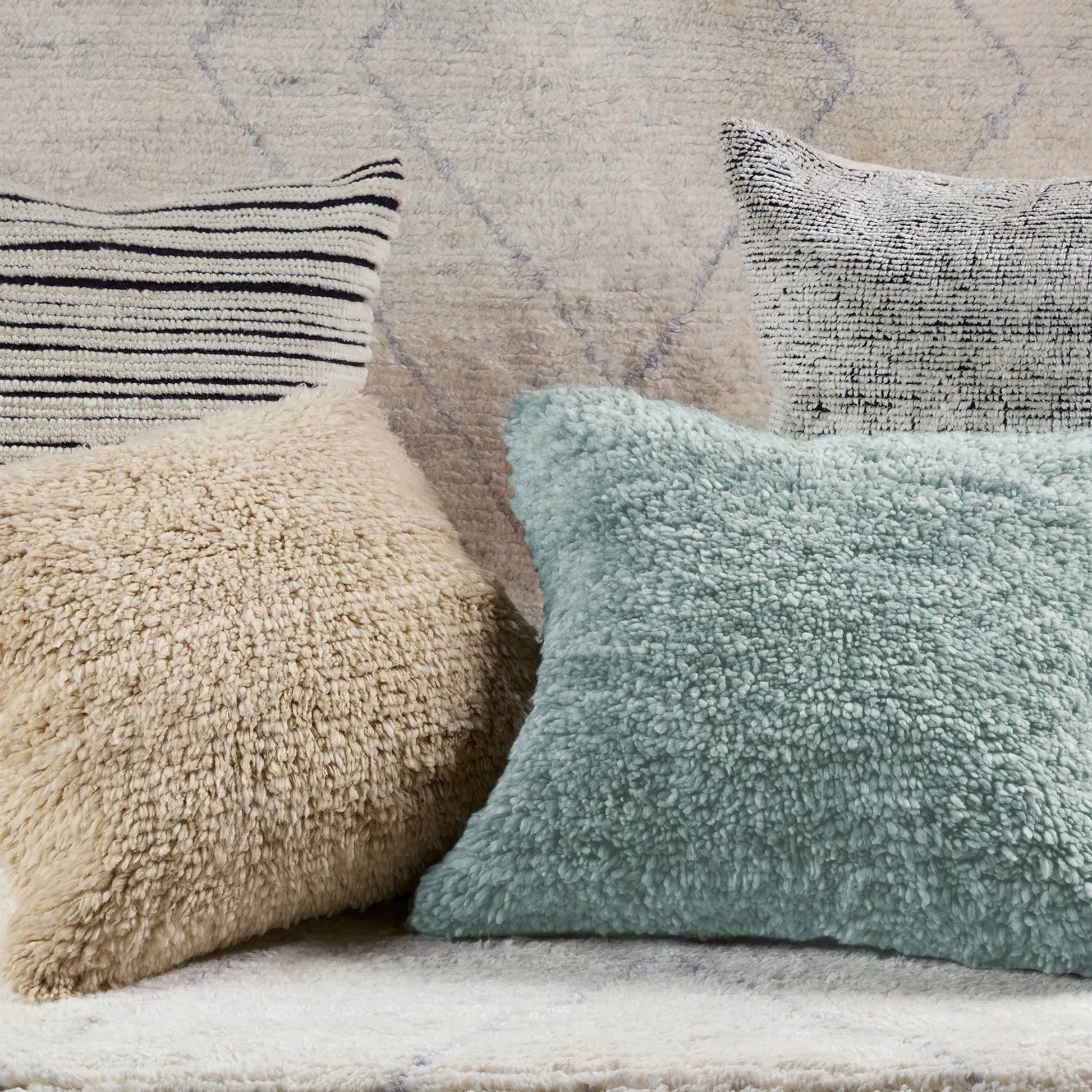 Montane MNT03 Pillow by Jaipur Living in gray. Made from 100% wool in a modern style.