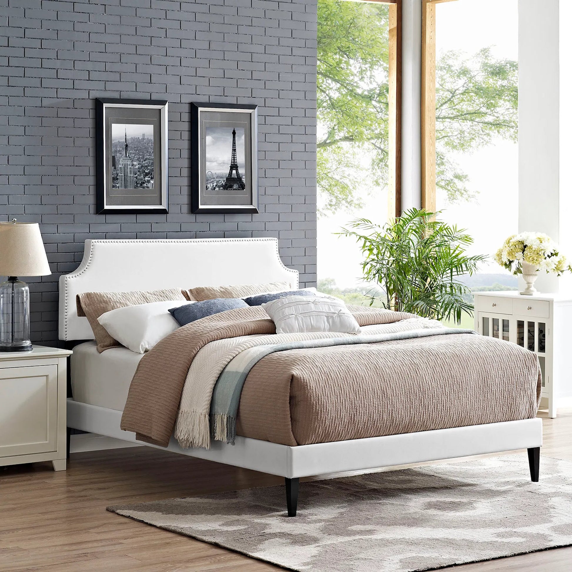 Ava Platform Bed with Squared Tapered Legs by Evans & Londeen in white. Made from vinyl in a transitional style.