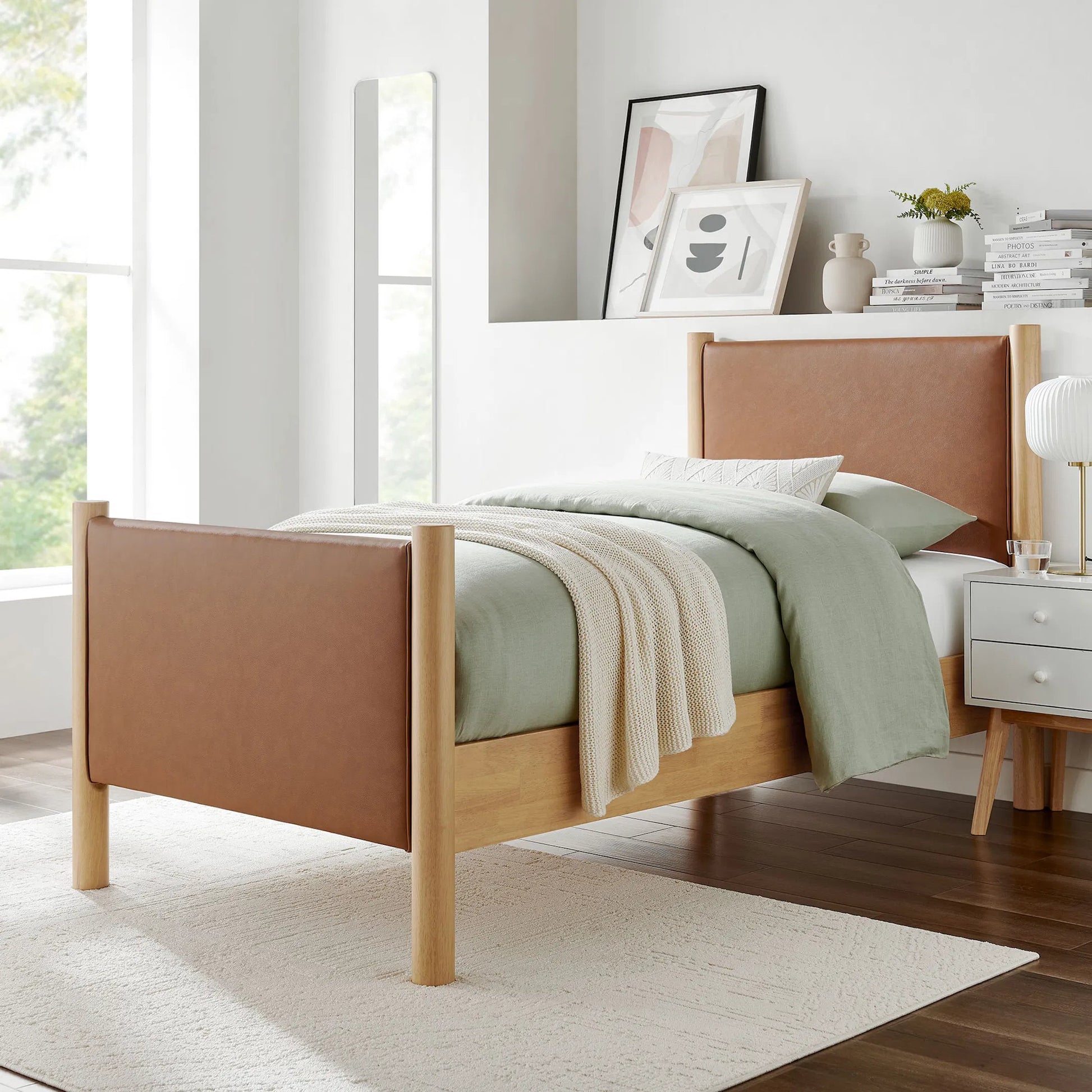 Sevier Size Vegan Platform Bed by Evans & Londeen. Made from vegan leather upholstered in a transitional style.