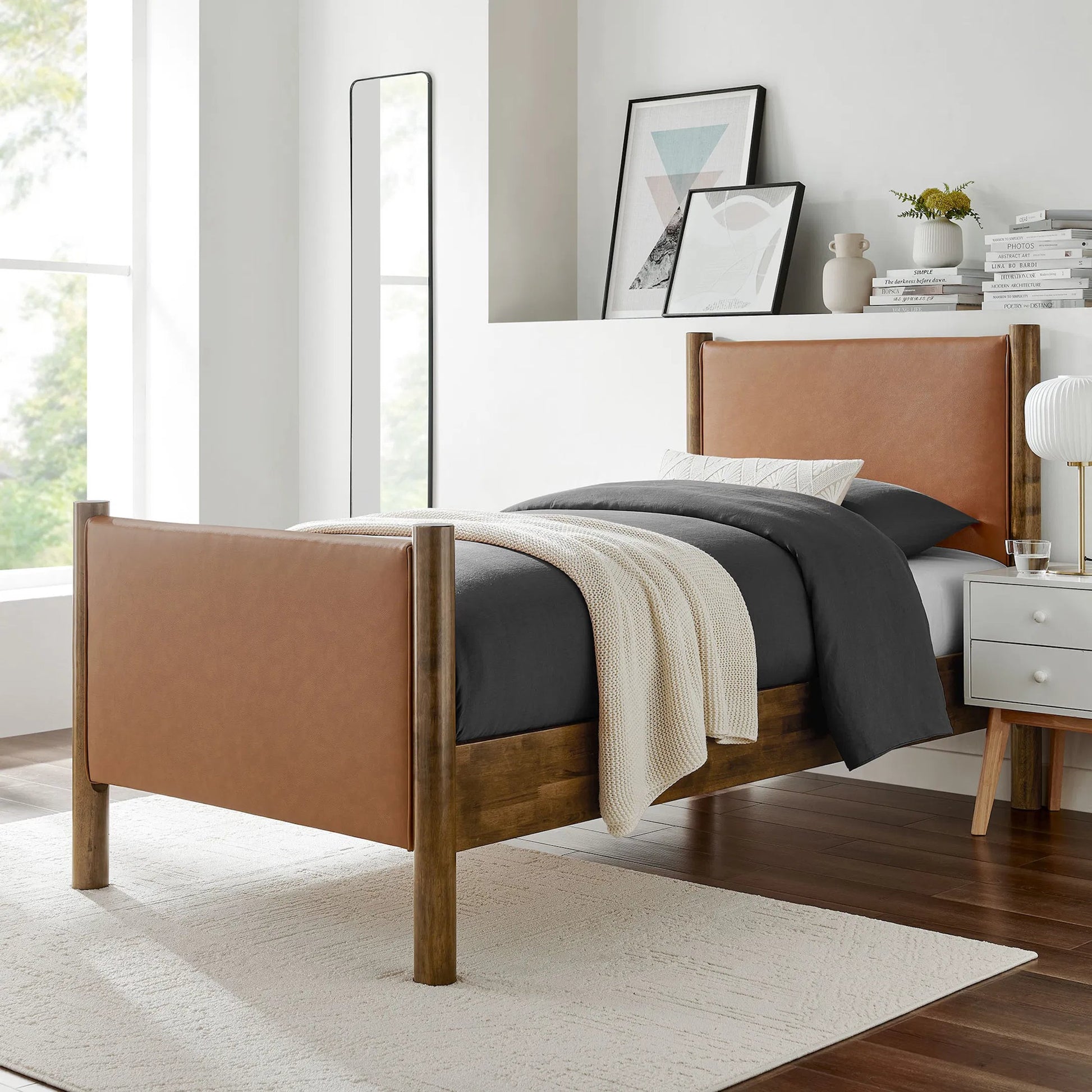 Sevier Size Vegan Platform Bed by Evans & Londeen. Made from vegan leather upholstered in a transitional style.