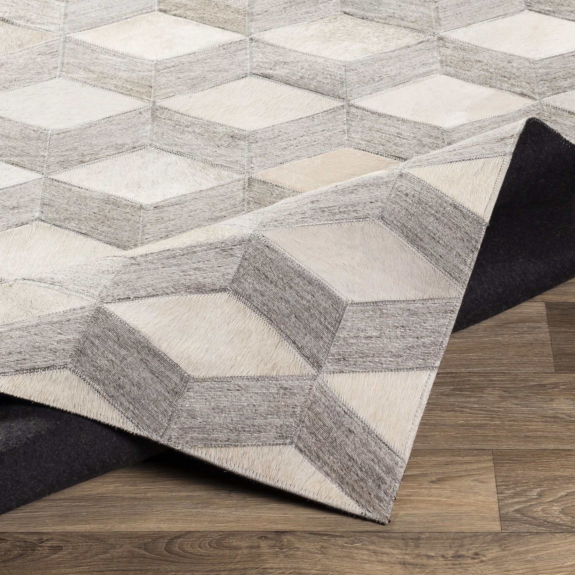 Medora Rug - 22910 by Surya in oatmeal, light gray, medium gray. Made from 65% hair on hide, 35% chenille-viscose in a unique style.