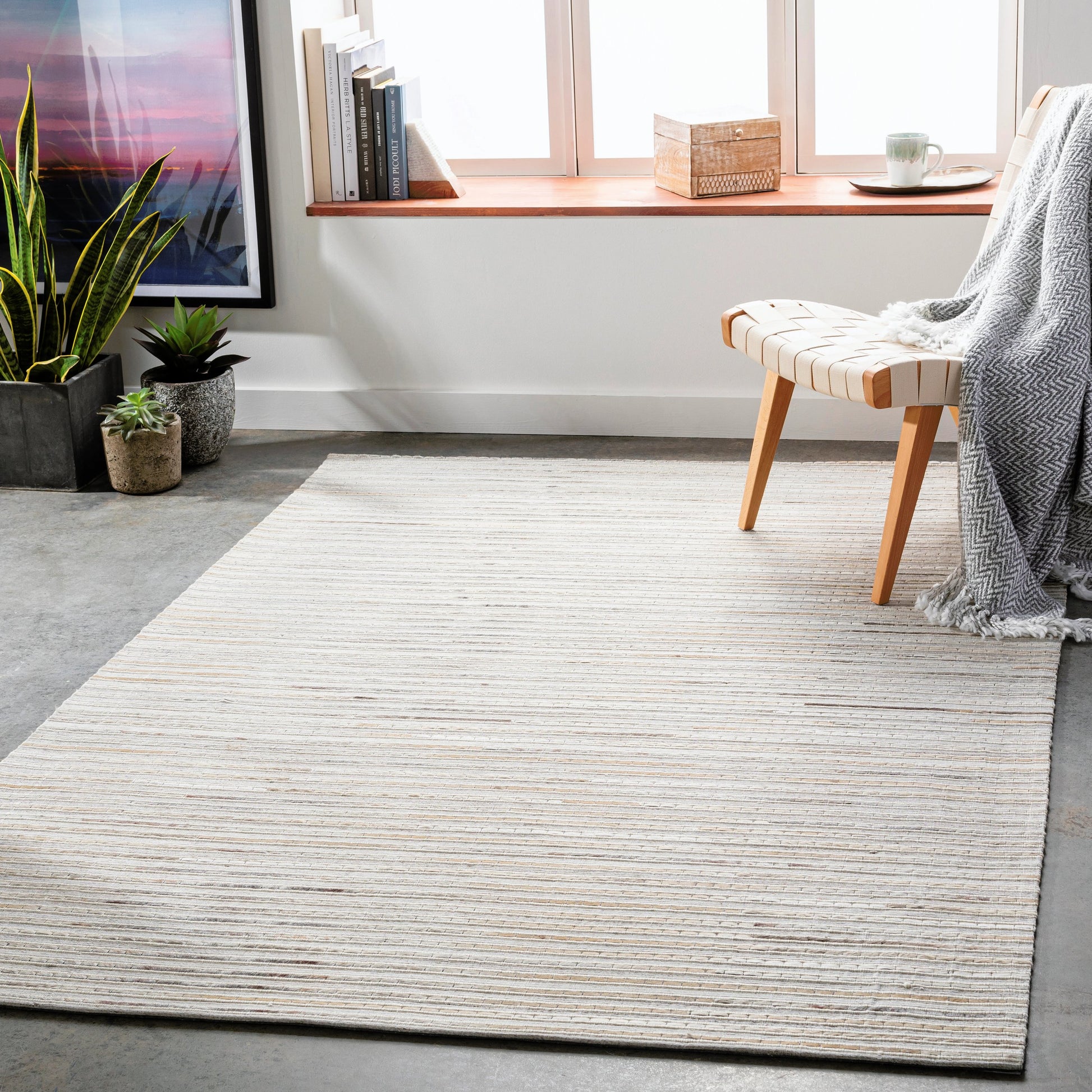 Medora Rug - 26072 by Surya in taupe, dark brown, oatmeal, black, medium gray. Made from 50% wool, 30% hair on hide, 20% viscose in a unique style.