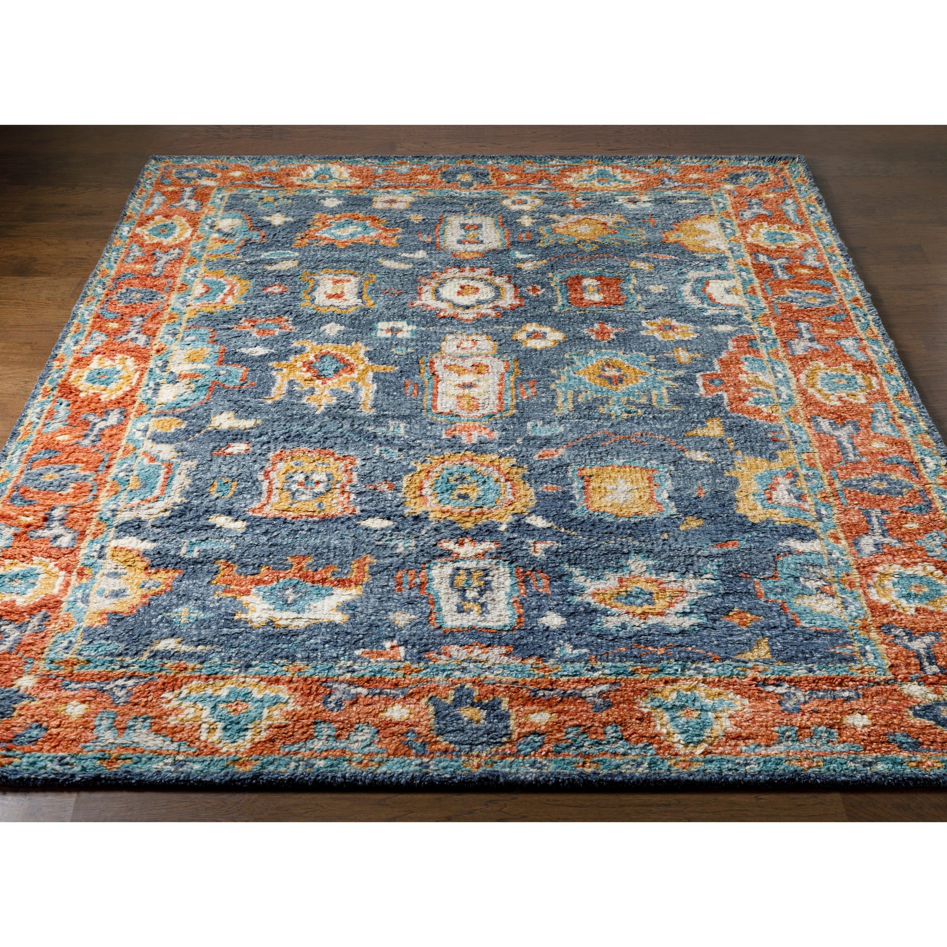 Marrakech MRK-2303 Rug by Surya in burnt orange, dusty coral, rust, dark blue, mustard, denim. Made from 100% wool in a unique style.