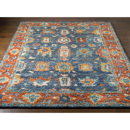 Marrakech MRK-2303 Rug by Surya in burnt orange, dusty coral, rust, dark blue, mustard, denim. Made from 100% wool in a unique style.