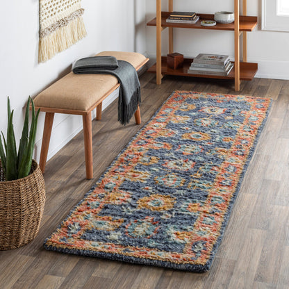 Marrakech MRK-2303 Rug by Surya in burnt orange, dusty coral, rust, dark blue, mustard, denim. Made from 100% wool in a unique style.