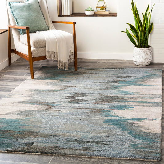 Montclair Rug - 24645 by Surya in teal, sea foam, beige, medium gray, aqua, ivory, dark brown. Made from 80% wool, 20% viscose in a unique style.