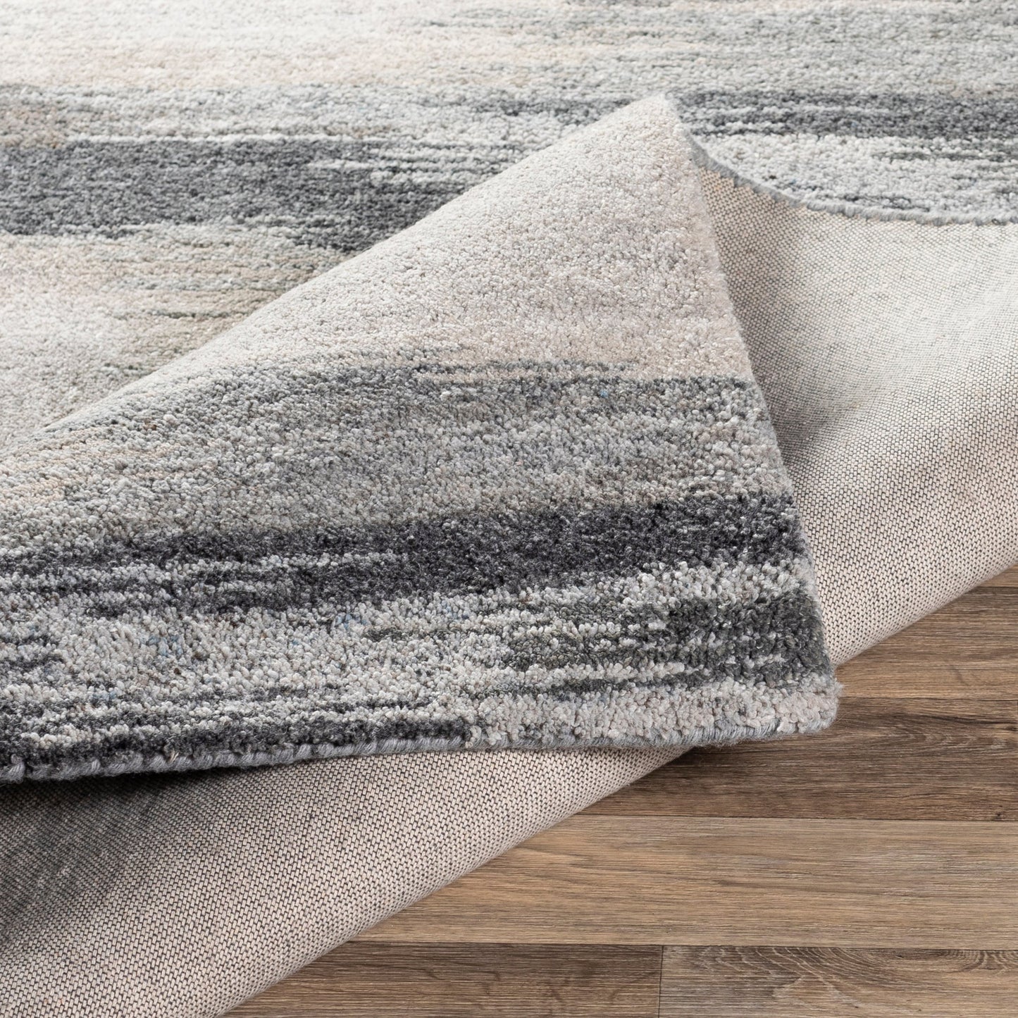 004 SR-756756,SR-756757 | Closeup | Montclair Rug - 24646 by Surya in charcoal, taupe, medium gray, dusty sage. Made from 80% wool, 20% viscose in a unique style.