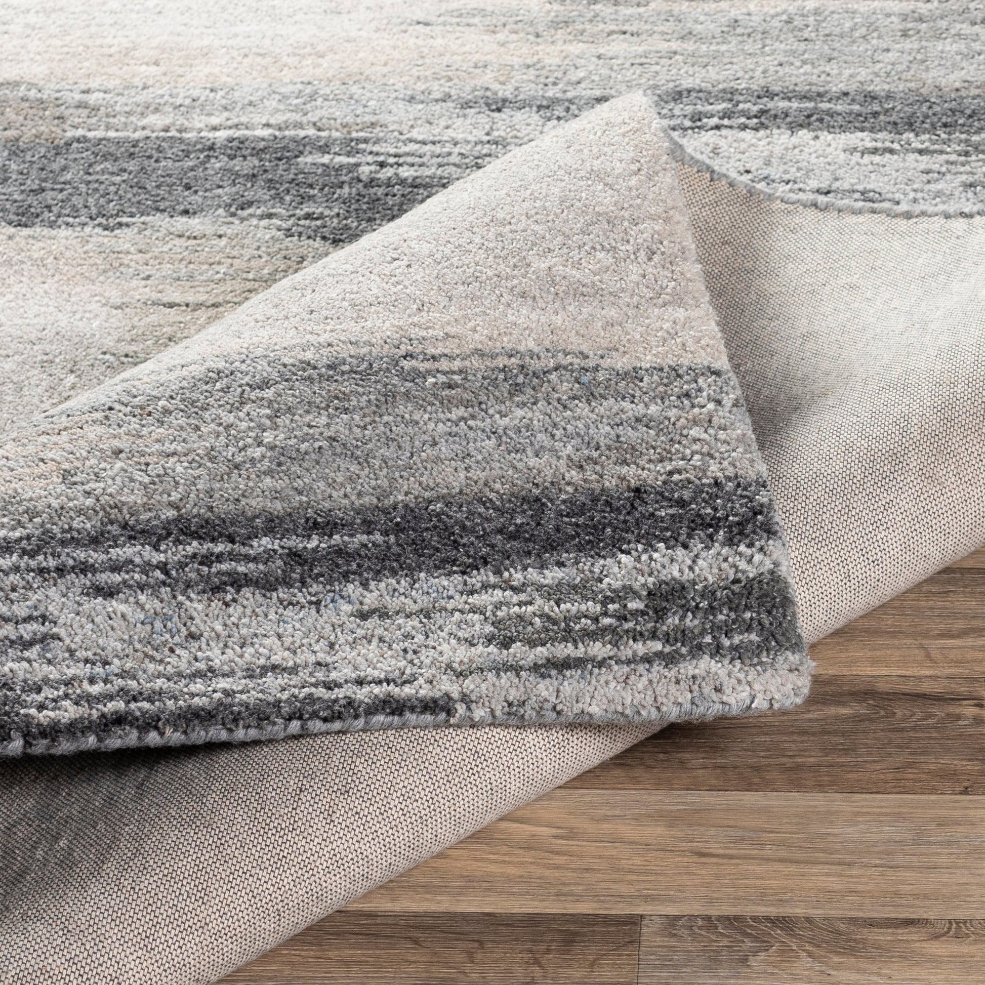 Montclair Rug - 24646 by Surya in charcoal, taupe, medium gray, dusty sage. Made from 80% wool, 20% viscose in a unique style.