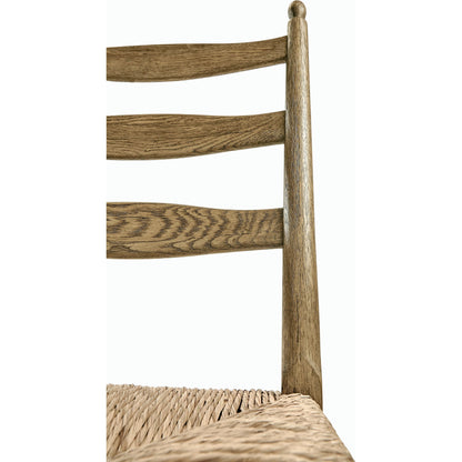 Timeless Doppler Ladderback Side Chair by Jonathan Charles in brown. Made from oak, fiber rush, foam, fabric in a coastal style.