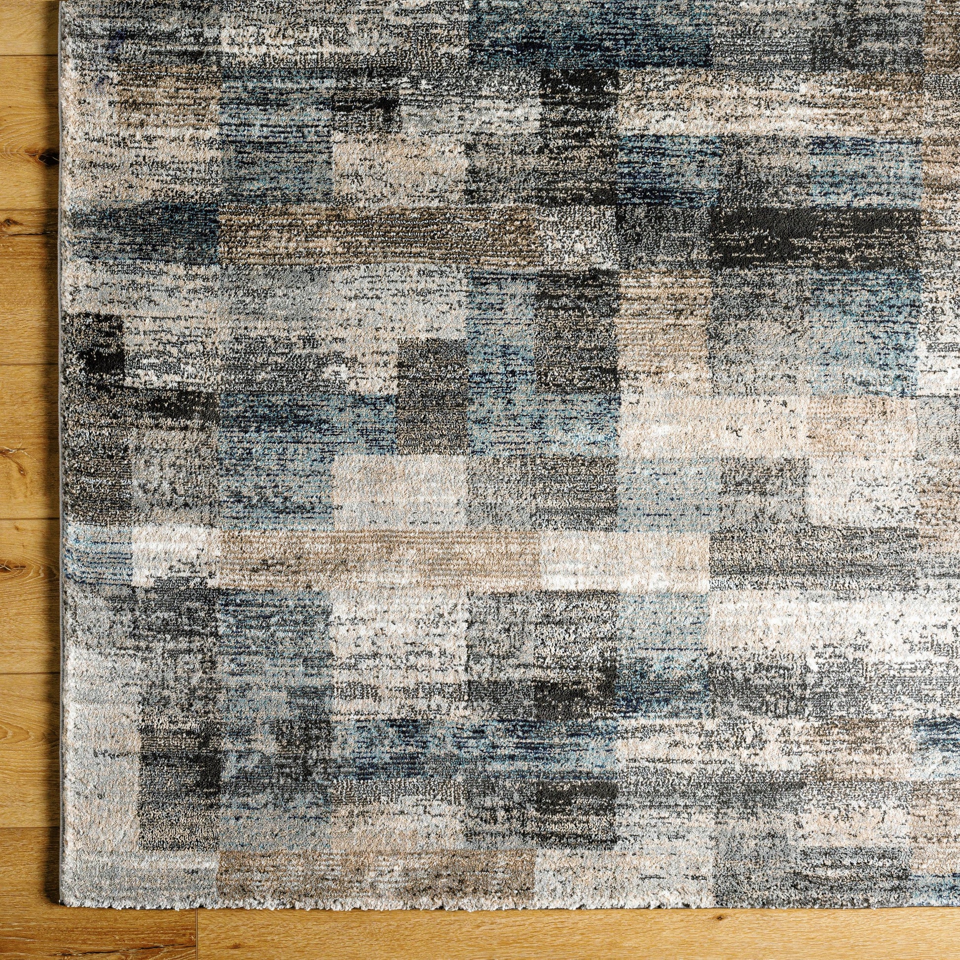 Montana Rug - 494870 by Livabliss in gray, tan, ivory, black, dark blue, pale blue. Made from face: 85% polypropylene, 15% polyester, warp: 100% jute in a unique style.