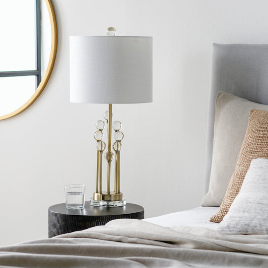 Mcvey - 29876 by Surya in body: gold, clear, base: clear, finial: clear, harp: metallic - gold, cord: translucent and translucentantiquedpolishednatural. Made from shade (outside): linen, body: crystal, body: metal, base: glass