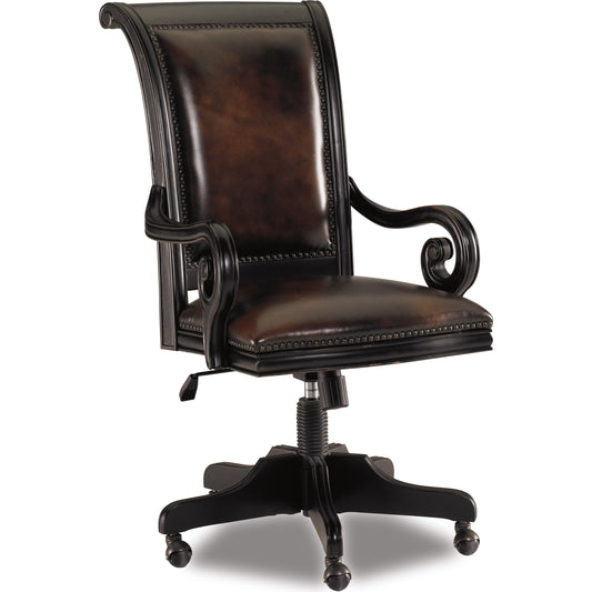 Telluride Tilt Swivel Chair by Hooker Furniture in brown. Made from cherry veneers with carved leather (aniline plus pigment), nailhead trim in a unique style.