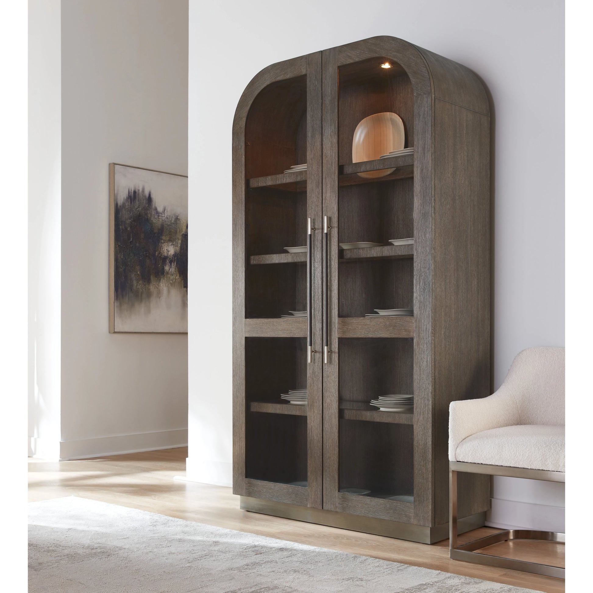 Modern Mood Display Cabinet by Hooker Furniture. Made from oak veneers, metal, glass in a modern style.