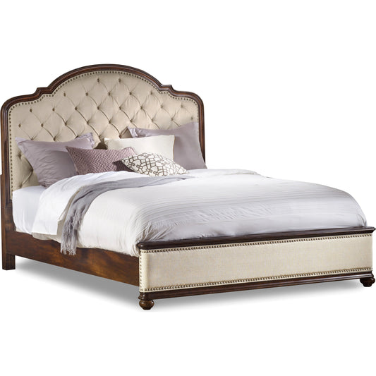 Leesburg Upholstered Bed by Hooker Furniture in alabaster and mahogany. Made from hardwoods with fabric, nailheads in a traditional style.