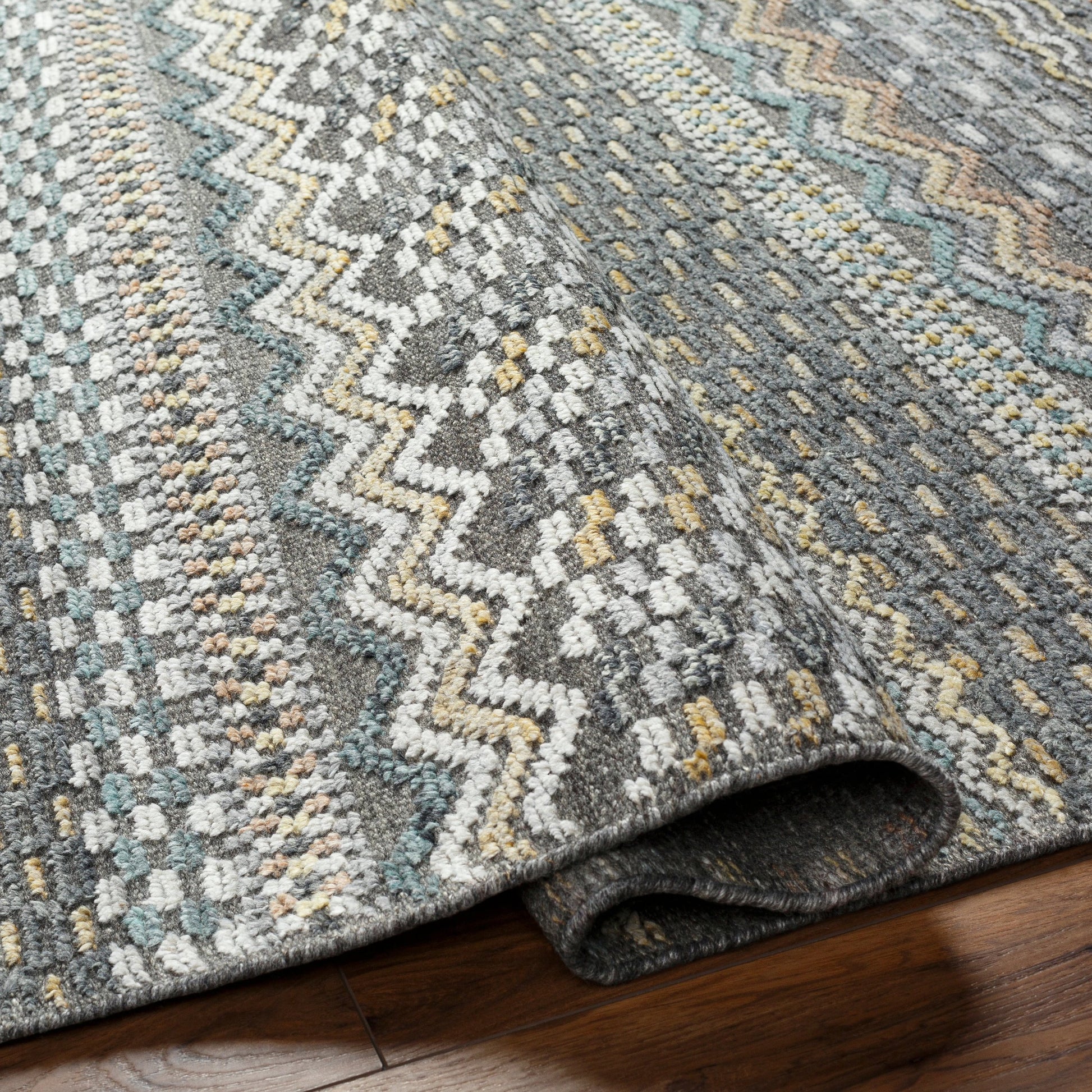 Nobility Rug - 29791 by Surya in charcoal, light gray, wheat, peach, ice blue. Made from 60% wool, 40% viscose in a unique style.