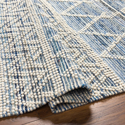 Nadine Rug by Livabliss in ivory, navy, dark blue. Made from main: 70% cotton, main: 30% wool in a cottage & farmhouse style.