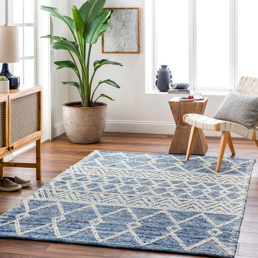 Nadine Rug by Livabliss in denim. Made from main: 70% cotton, main: 30% wool in a cottage & farmhouse style.