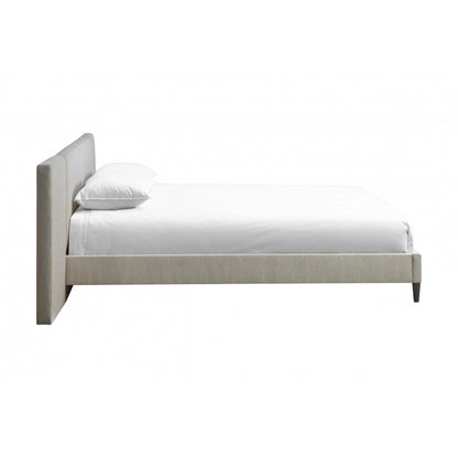 Zest Upholstered Bed with Wings by Zest. Made from rubberwood, fabric in a modern style.