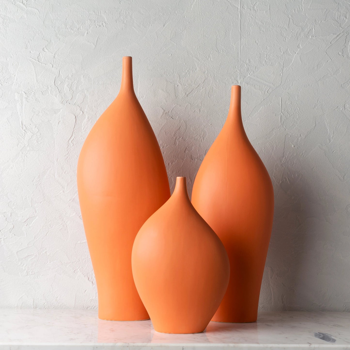 002 SI-1887159 | Lifestyle | Neo - 24670 (Set of 3) by Livabliss in orange and glazed. Made from ceramic in a modern style.